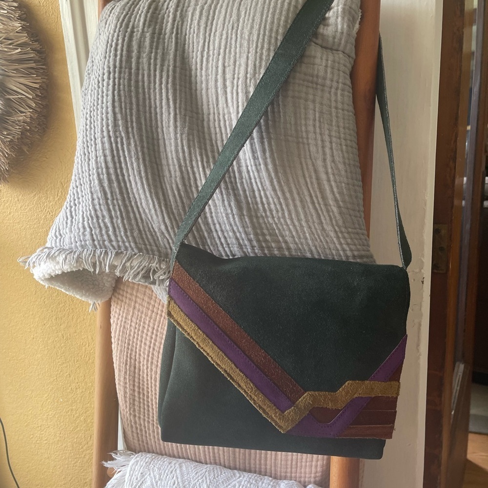 Stylish Green Suede Shoulder Bag with Purple and Gold Accents